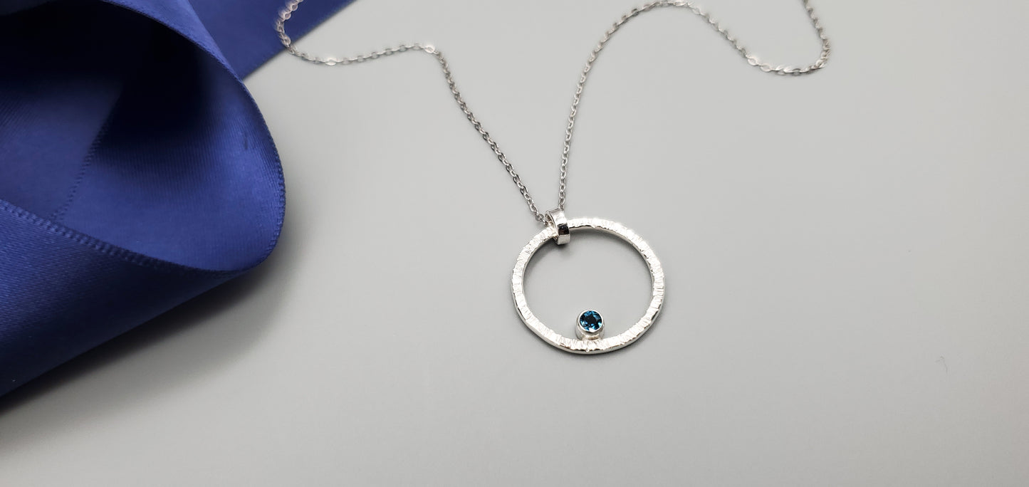 Sunburst with London Blue Topaz
