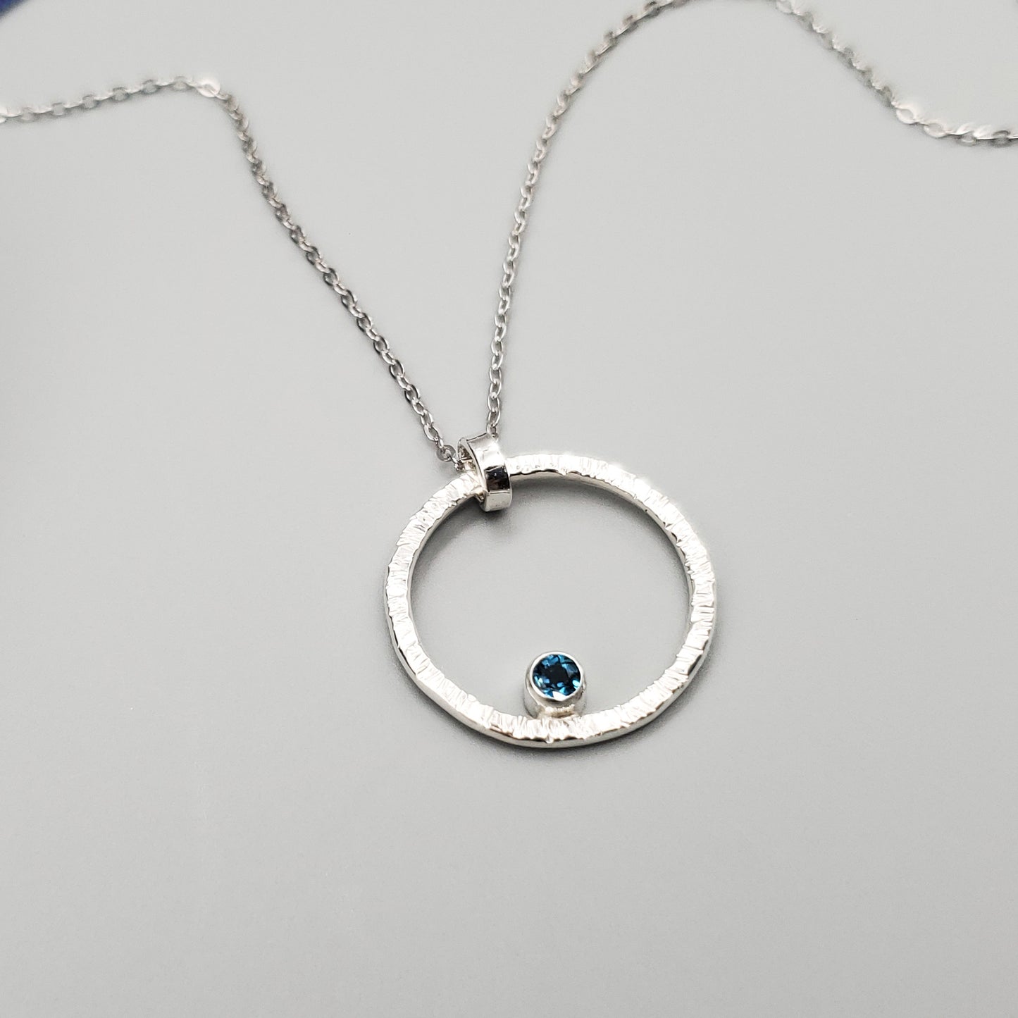 Sunburst with London Blue Topaz