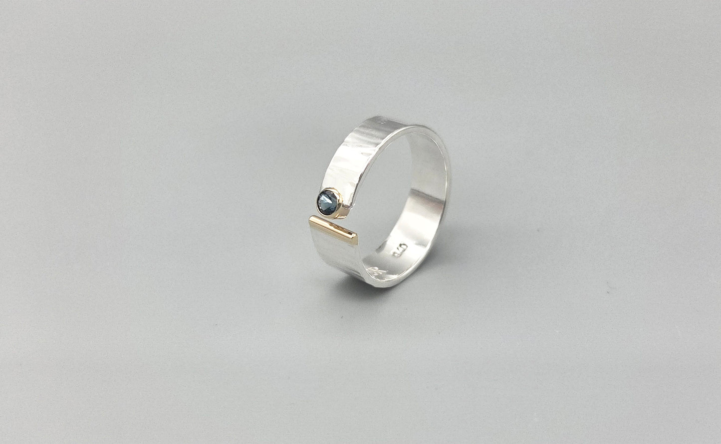 Silver and Gold Open Design Band London Blue Topaz Ring