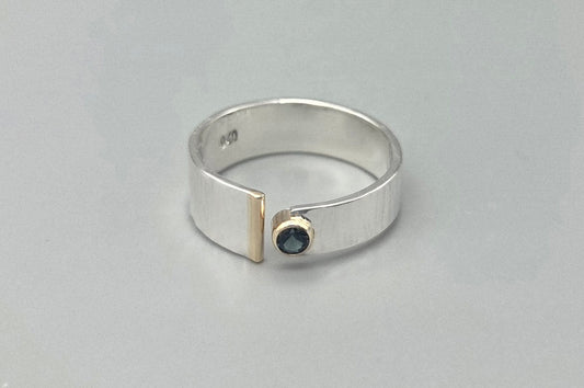 Silver and Gold Open Design Band London Blue Topaz Ring